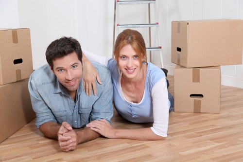 Careful unloading of boxes and furniture at a Barnes property