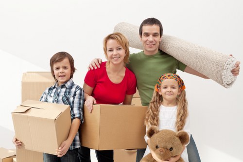 Local removalists unloading boxes at a Barnes home