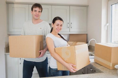 Local furniture collection team handling wardrobes and tables in Barnes